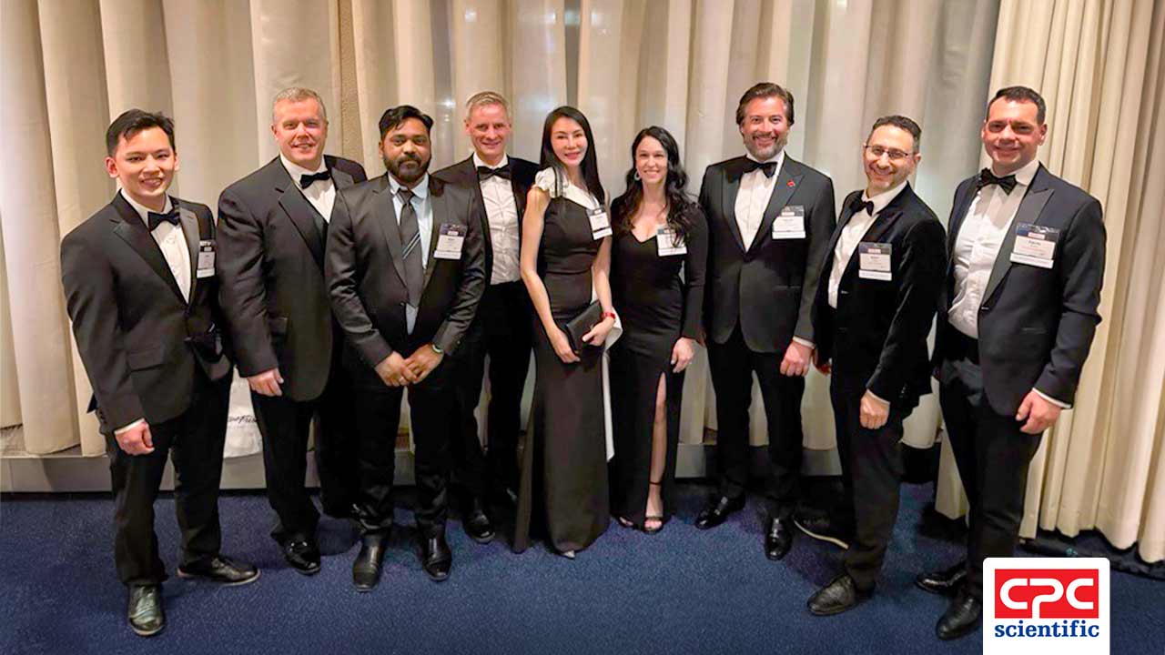 Theresa Cheng and Tim Nieters pose with CPC Scientific's guests at the 98th DCAT Annual Dinner